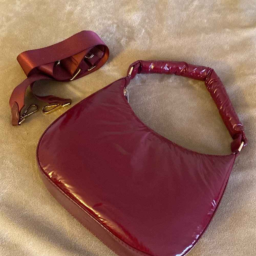 Burgundy puffy purse with adjustable strap